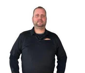 Male Employee smiling with white background