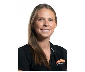 Female employee smiling with white background