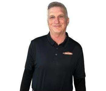 Male Employee smiling with white background