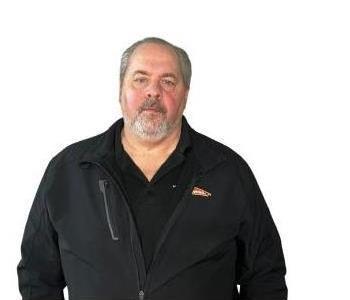 Male Employee smiling with white background