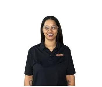 Female employee smiling with white background