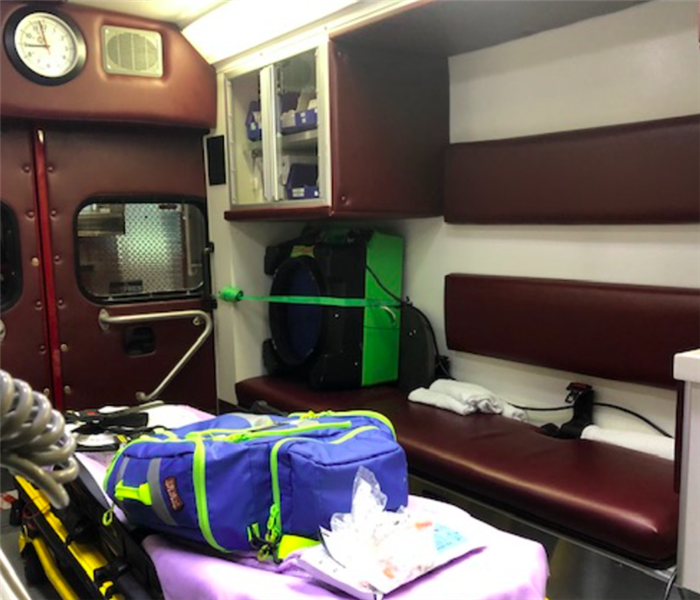 green hepa air scrubber in back of ambulance