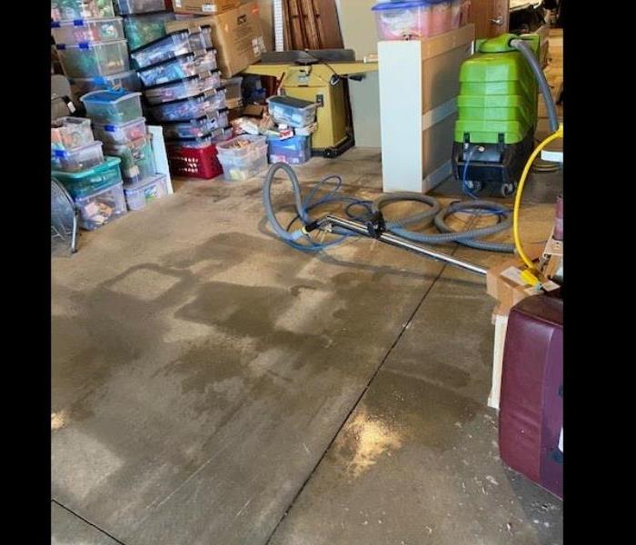 water on concrete floor in basement