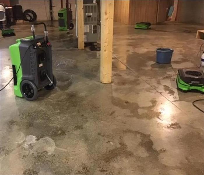 equipment set on concrete floor of basement