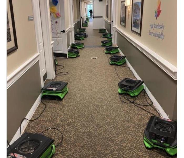 equipment set in hallway of commercial building