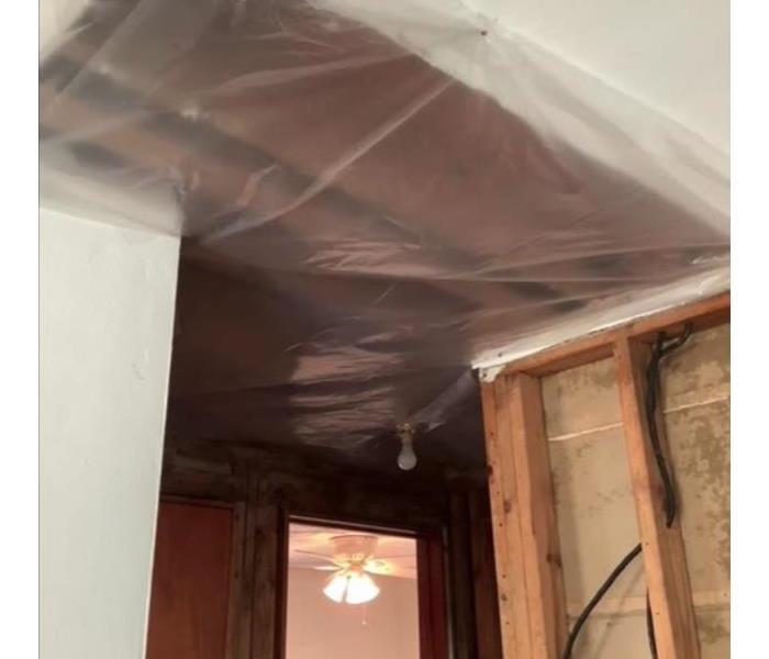 ceiling and walls removed after water loss